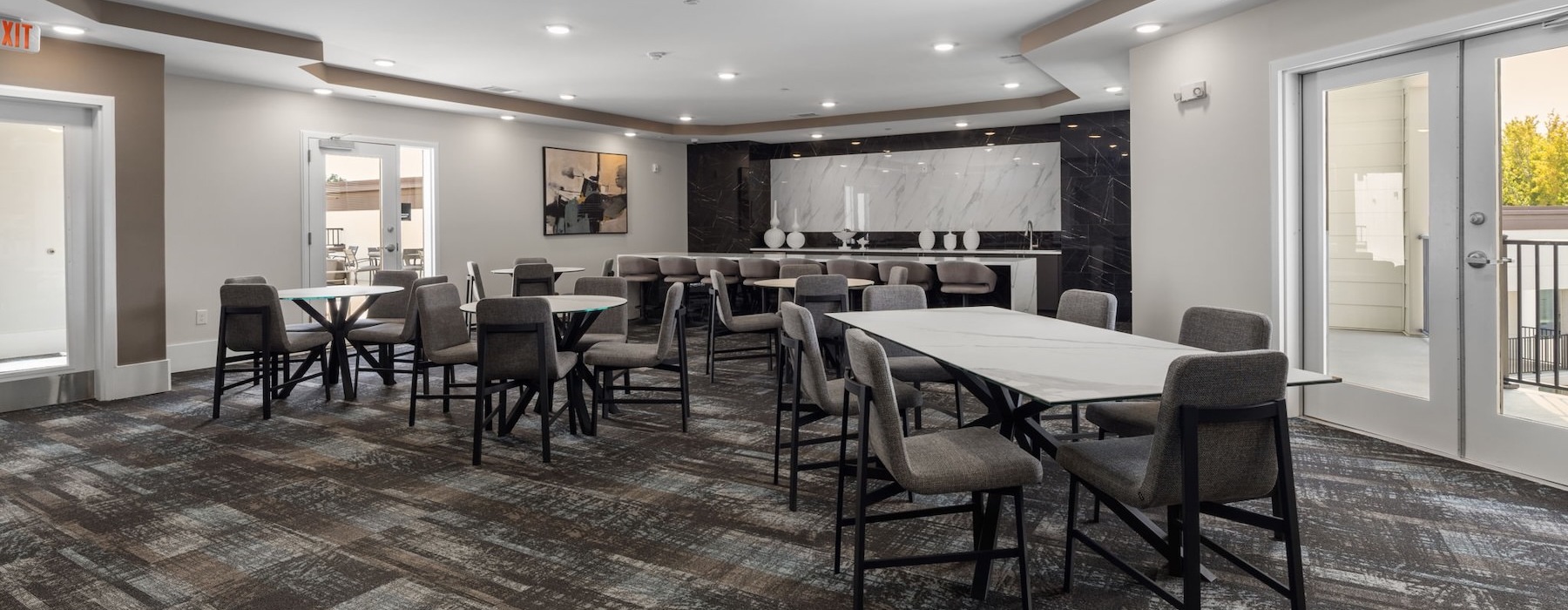 a room with tables and chairs