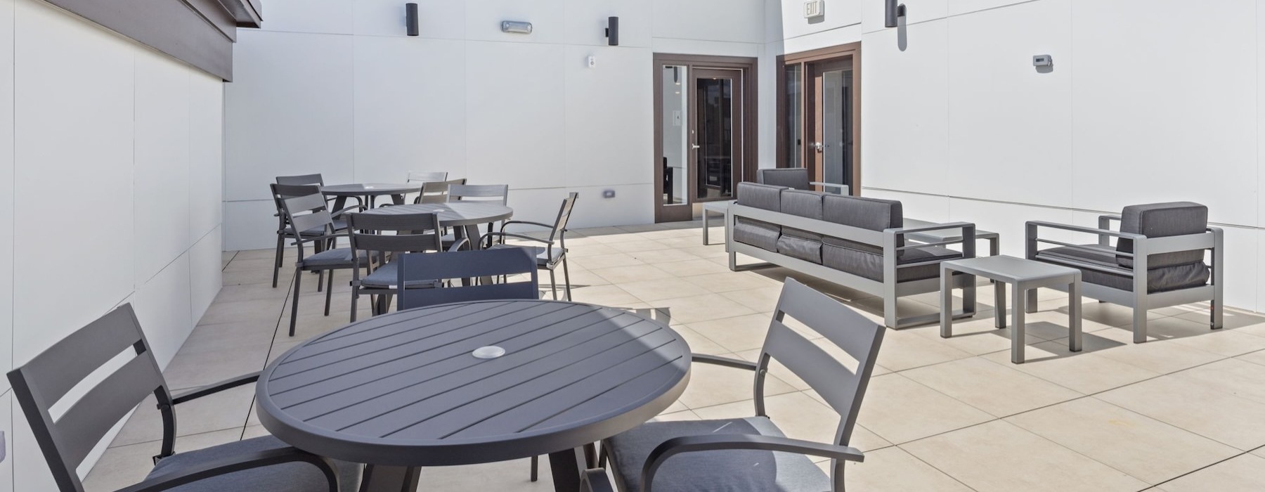 State-of-the-art amenities a room with tables and chairs