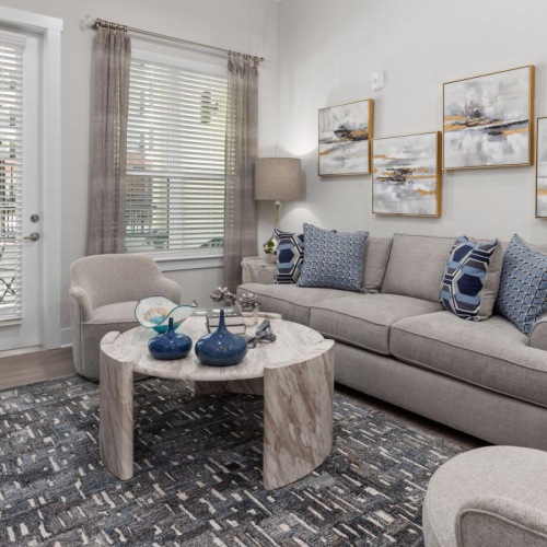 a living room with a couch and a coffee table